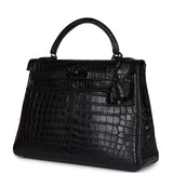Hermes Kelly Retourne 32 SO Crocodile Niloticus Noir Mat Clous Dorés Noirs