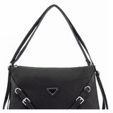 Black handbag cross