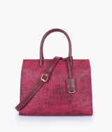 Red color crocodile vintage handbag