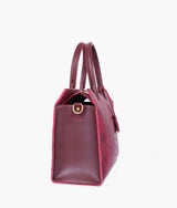 Red color crocodile vintage handbag