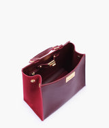 Burgundy suede front lock top-handle mini bag for women