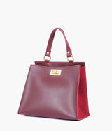 Burgundy suede front lock top-handle mini bag for women