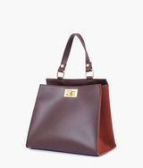 Dark brown suede front lock top-handle mini bag for women