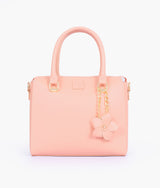 Peach handbag with flower charm for women
